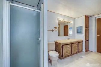 The 5 piece primary bath has a separate tub and shower.