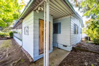 At the back of the home is a convenient storage shed.