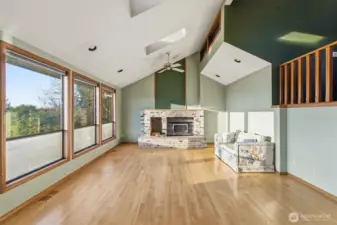 Main Floor Living Room w/ Hardwood Floors, Fireplace, Vaulted Ceiling and Views