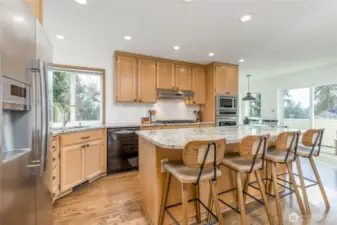 Bright and spacious gourmet kitchen with a highly functional layout ideal for everyday living and entertaining