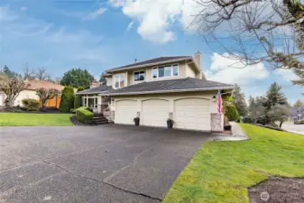 Attached 3-car garage and extended driveway provide plenty of parking space. Plenty of street parking for guests, too!