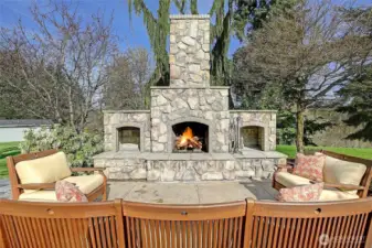 Relax on the back patio with a fire in this gorgeous stone fireplace.