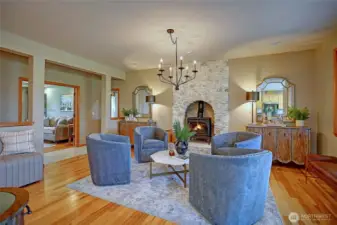 Adjacent to the kitchen and office/den.