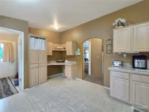 Dedicated Desk Space – Conveniently located in the kitchen, this built-in desk area is perfect for staying organized or creating an ideal homework station for the family