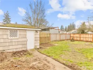 Shed in the backyard for additional outside storage.