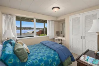 Lower level bedroom offers lake views.