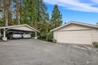 Two car garage and carport, offer plenty of parking.