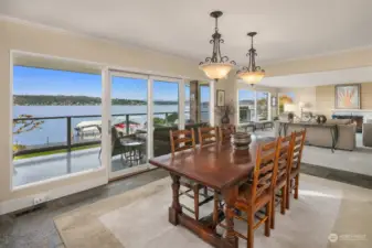 Open dining room enjoys lake views.