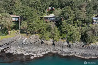 Located on the Westside with 238ft of high bank waterfront.