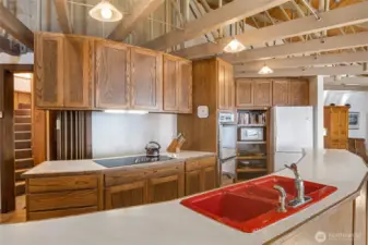 Another view of the kitchen. The stairs on the back left lead up to the bonus room in the pedestal.