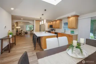 Amazing kitchen is a chef's delight with new quart countertops, newer stainless steel appliances, tons of storage, skylight, designer lighting and generous dining space.