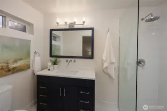 Completely remodeled primary bath with amazing walk in shower.