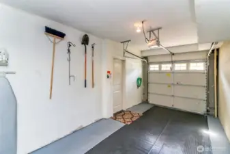 2 car tandem garage with remote opening and walk thru door to upstairs - no need to go outside!