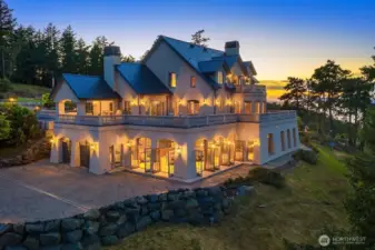 All structures have authentic Spanish slate roofs with copper downspouts leading to an 88,000 gallon water-catchment cistern. Custom exterior light fixtures throughout all structures; and the Guest House, the Carriage House and the Main House are traditional stucco with 1 foot thick exterior walls, Loewen aluminum-clad exterior divided glass double pane Low E rounded recessed doors and windows with divided glass and cedar wood interior trim.