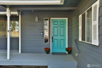 Come on in! If its raining you won't get wet - awesome covered porch.