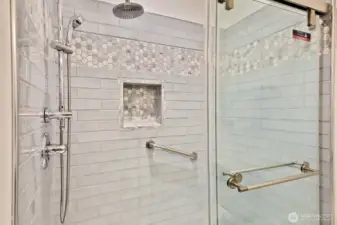 Beautifully updated 3/4 shower in the primary suite.