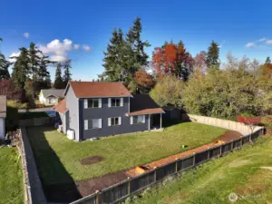 Another look at the fully fenced backyard and new gaming area.