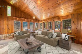 Amazing great room opens onto river and huge deck. Suggested furniture placement for easy access to door/views.