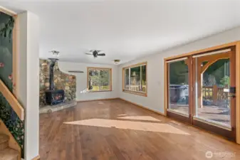 Double doors open to incredible deck and river