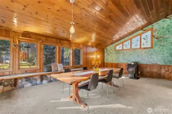 Surrounding by large windows, and custom nature murals