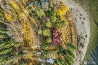 Red metal roof view of property