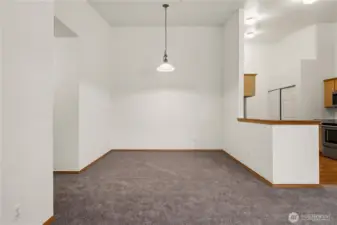 Dining room, hallway on the left.  Big Vaulted Ceilings, kitchen to the right