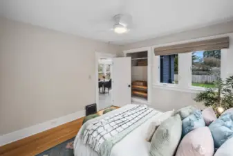 Custom window coverings & overhead fan.