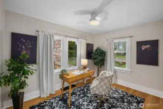 Bedroom #3 with built ins in closet and overhead fan.