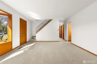 The natural light from the bay window brightens up the room!