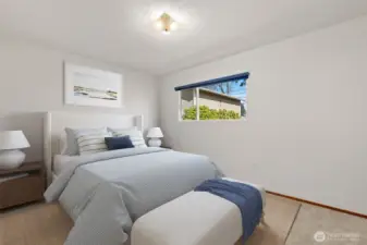 Primary bedroom down the hall (virtually staged)