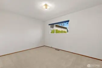 Primary bedroom with a semi-en-suite.