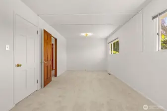 From the back of the bedroom looking to the other side.