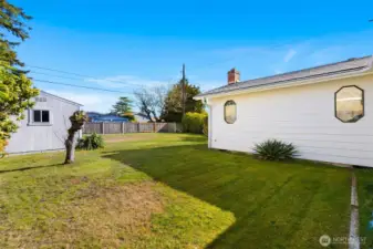 From the front left corner, looking to the additional living room.
