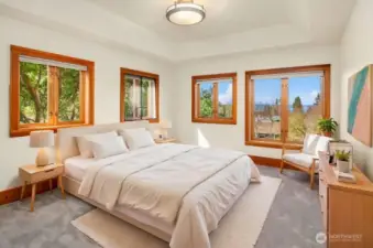 Comfortable bedroom on middle level with coved ceiling (virtual staging)