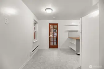 Inviting dining space with natural light, ideal for a cozy table setting.