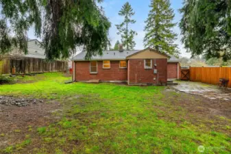 Generous yard provides room to expand outdoor living or create your dream garden.