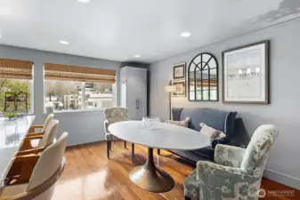 Window-wrapped dining with views & blinds you can control!