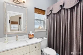 Full bath...one of the three and one-half baths that adorn the home