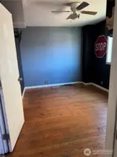 Primary on main floor with hardwoods