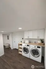 Virtually Staged Washer and Dryer Room in Basement