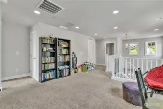 Another view of the upper loft area.  You'll see access to the full bathroom and the utility/laundry room is up here too!