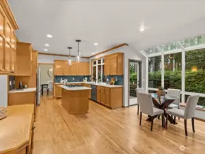 Kitchen nook with a wall of windows to enjoy the beautiful views.