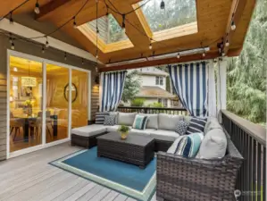 Amazing outdoor covered living space with infra-red heaters! This is an excellent upgrade!