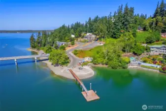 View of Raft Island Bridge and community beach/dock - your new home is 1/2 block away!