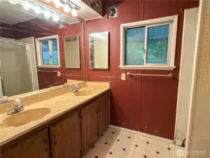 3/4 Bathroom with double sinks.