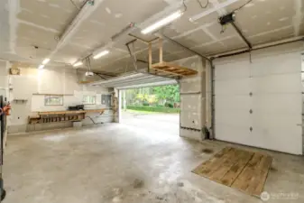 Three Bay Garage with your own maintenance pit.