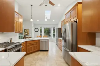Chef’s dream kitchen with newer appliances and fresh countertops.