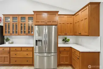 Generous cabinetry and expansive countertops ideal for cooking and entertaining.