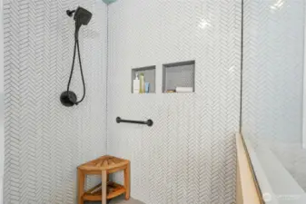 Huge walk-in shower with spa-like design.