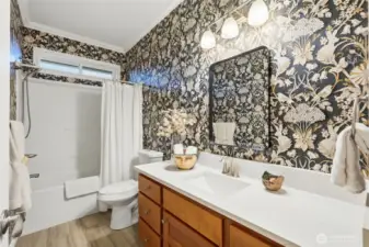 Main bath remodeled with heated floors for year-round comfort.